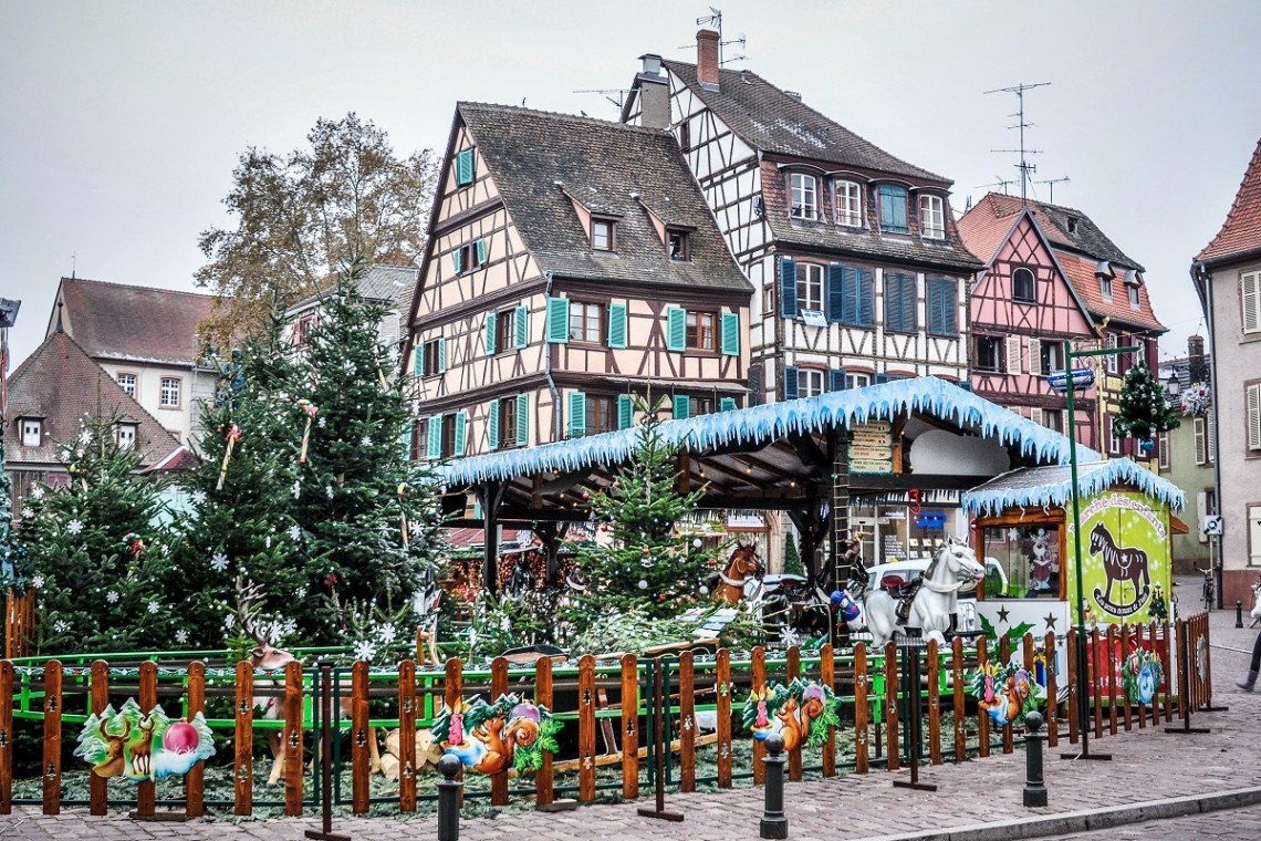 A Christmas market and half-timbered houses in Colmar
