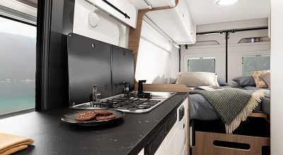 Einzelbetten und Schottwand beim Corigon Campervan CV 65 S