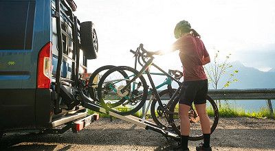 pushing a bike on the Bike Carrier Swing