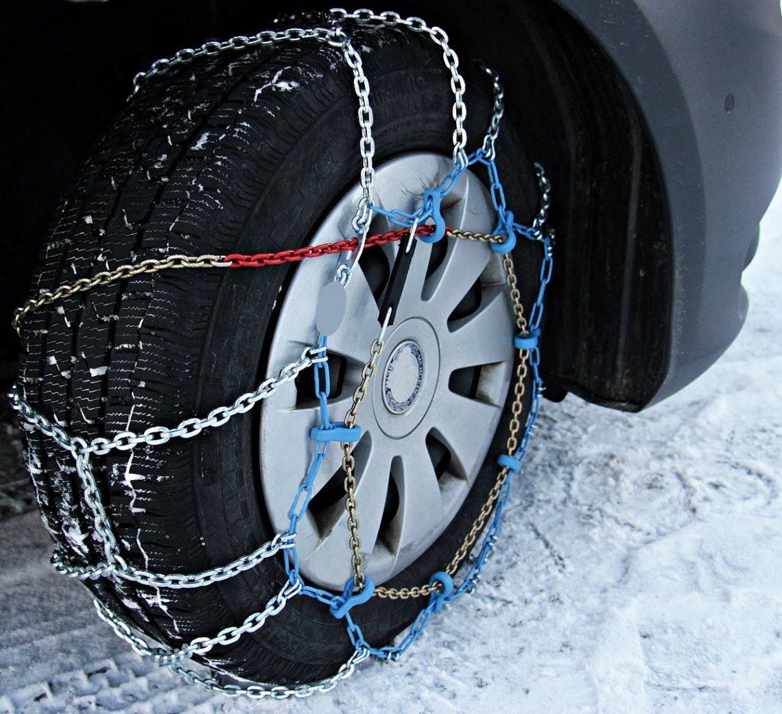Snow chains attached to the front wheel