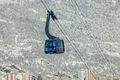 Cable car on the snowy Brambrüesch mountain, Chur