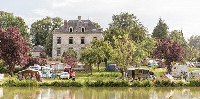 View across the water of the Le Brévedent campsite in Normandy