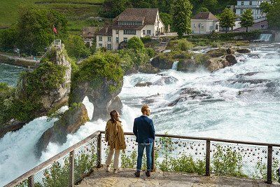 Couple at photo spot at the Rhine Falls