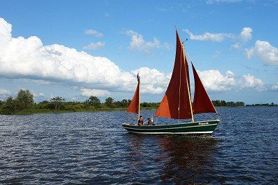 A sailing boat on the Sneekermeer in Friesland