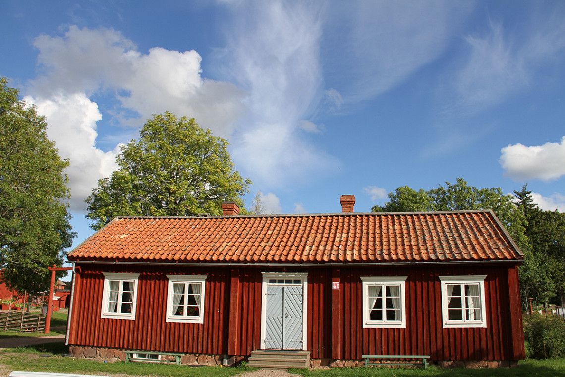Rotes Holzhaus auf Aland