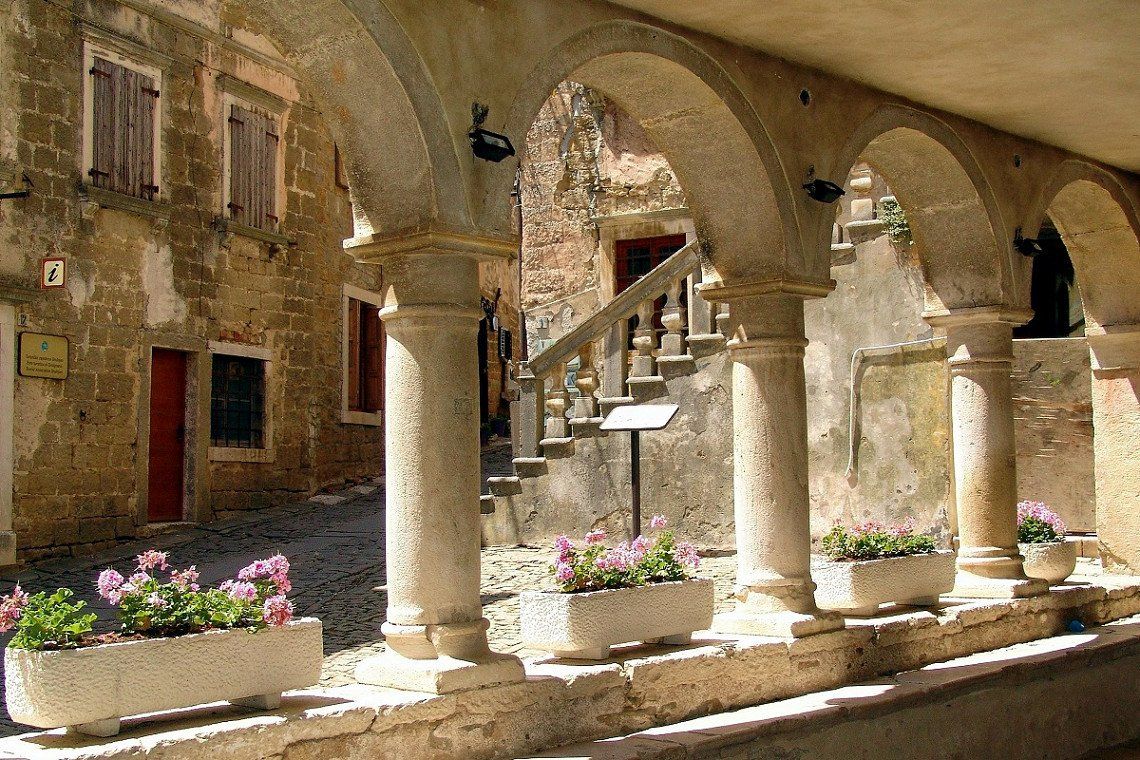 Columned arches in the old town of Grožnjan, Istria