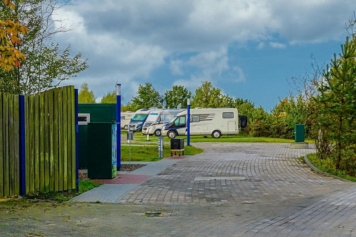 An RV park with a machine for emptying and cleaning toilet cassettes