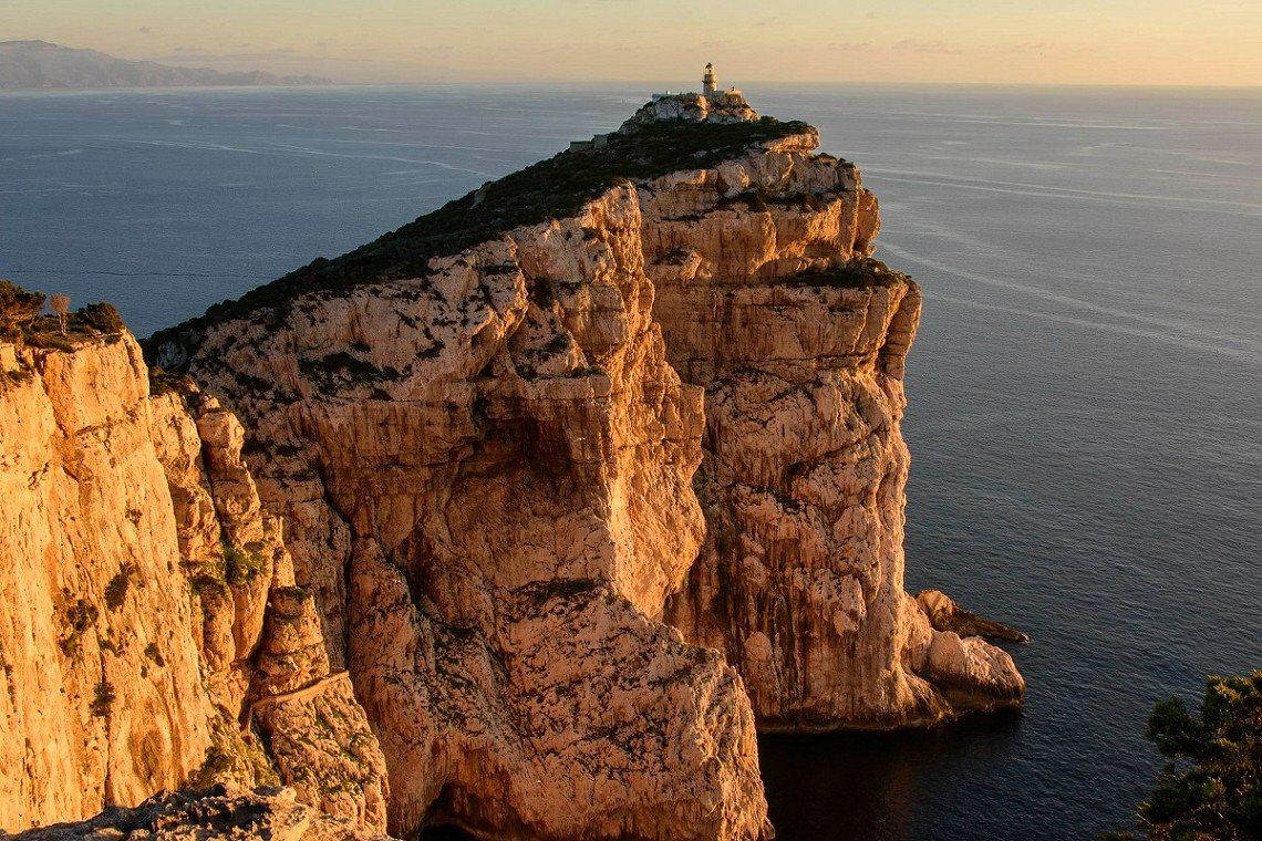 Lighthouse at Capo Caccia in the sunset, Sardinia