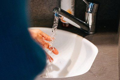 washing hands in the bathroom of a Dethleffs motorhome