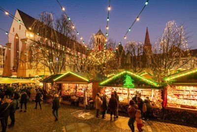 Freiburg Christmas market illuminated in the evening