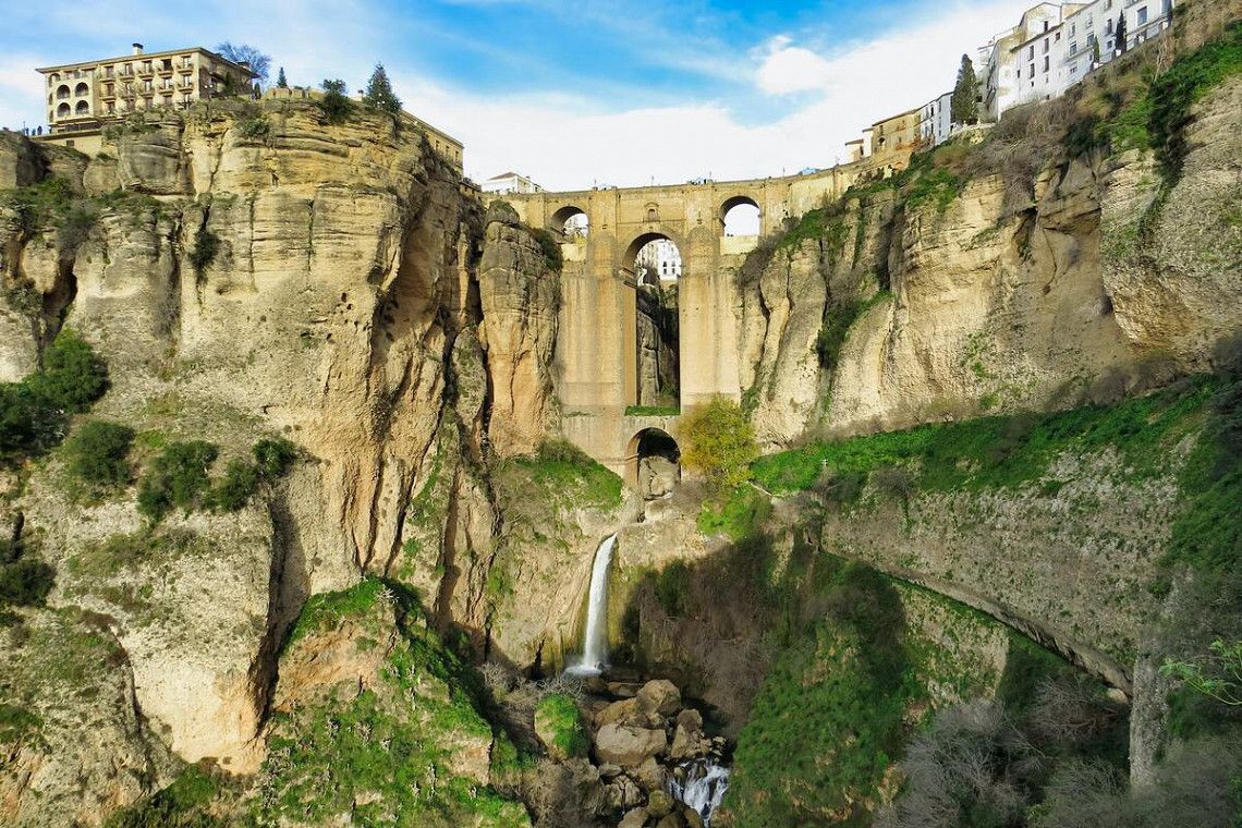 View of the Puente Nuevo bridge in Ronda from the gorge below